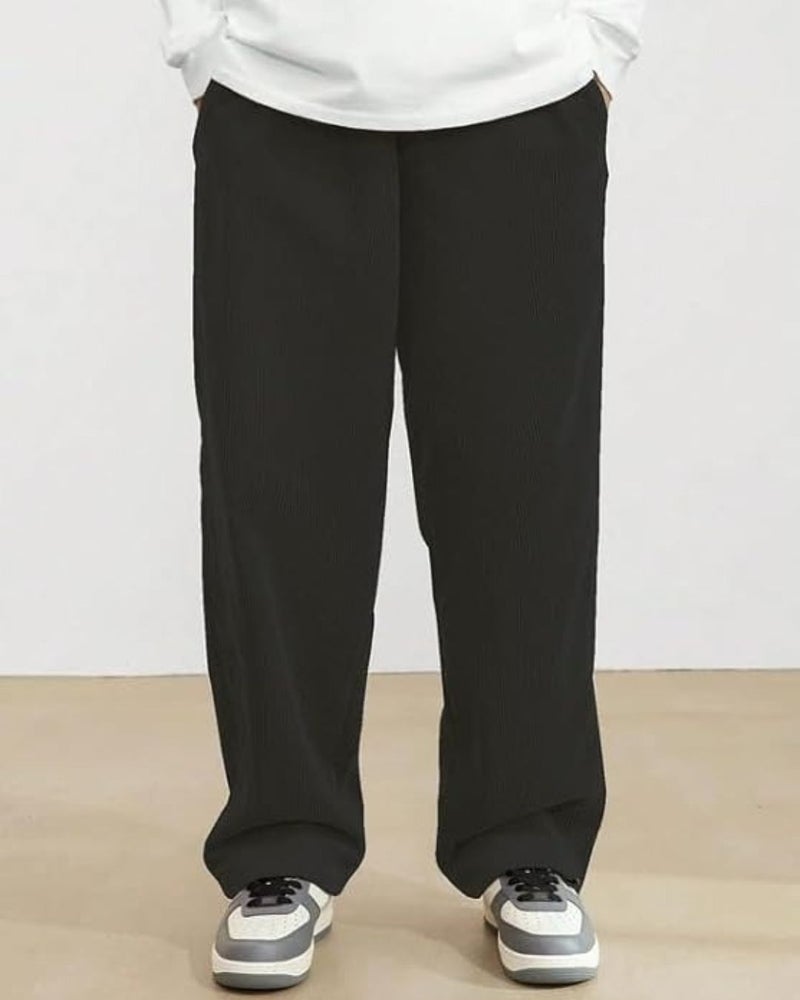 فلاينوف بنطلون رياضي رجالي كوري أسود سادة بقصة فضفاضة - Image 1